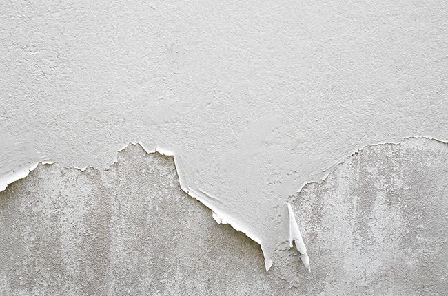 White peeling paint wall